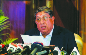 Indian cricket board President Srinivasan speaks to the media during a news conference in Kolkata